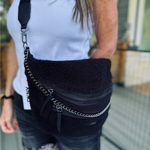 Brand new DKNY Sling Bag with Chain and Zippers